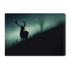 Obraz na płótnie Sylwetka jelenia w lesie w odcieniach koloru szarego i niebieskiego