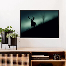 Obraz w ramie Sylwetka jelenia w lesie w odcieniach koloru szarego i niebieskiego