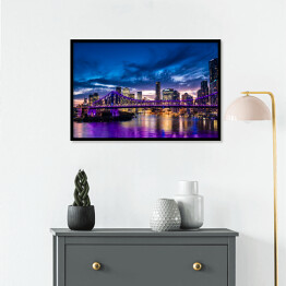 Plakat w ramie Panorama miasta Brisbane w Australii rozświetlona purpurowymi światłami