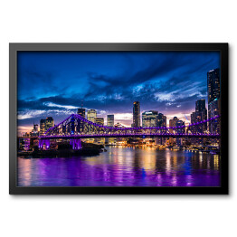 Obraz w ramie Panorama miasta Brisbane w Australii rozświetlona purpurowymi światłami