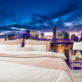 Fototapeta Panorama miasta Brisbane w Australii rozświetlona purpurowymi światłami