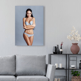Obraz na płótnie Piękna dziewczyna w seksownej bieliźnie na szarym tle