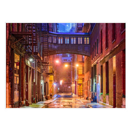 Plakat samoprzylepny Oświetlona uliczka w Nowym Jorku nocą