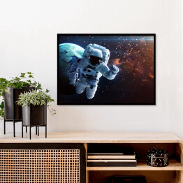 Plakat w ramie Astronauta podążający w stronę mgławicy