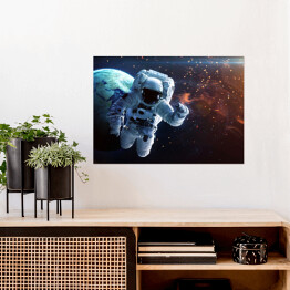 Plakat Astronauta podążający w stronę mgławicy