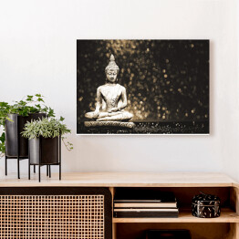 Obraz na płótnie Budda na błyszczącym czarnym tle 