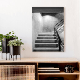 Obraz na płótnie Betonowe schody z czarną stalową poręczą