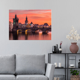 Plakat samoprzylepny Most Karola w Pradze z czerwonym zmierzchem w tle - Czechy