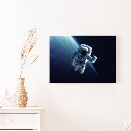Obraz na płótnie Astronauta w przestrzeni kosmicznej