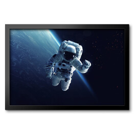 Obraz w ramie Astronauta w przestrzeni kosmicznej