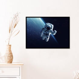 Plakat w ramie Astronauta w przestrzeni kosmicznej