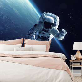 Fototapeta winylowa zmywalna Astronauta w przestrzeni kosmicznej