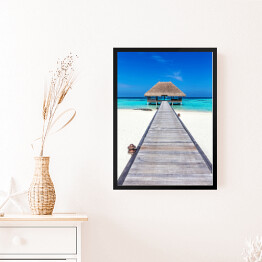 Obraz w ramie Drewniany domek na tropikalnej plaży w słoneczny dzień