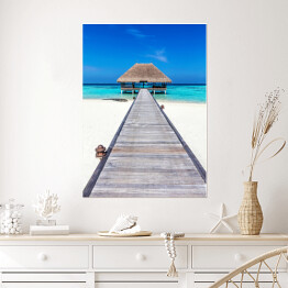 Plakat Drewniany domek na tropikalnej plaży w słoneczny dzień