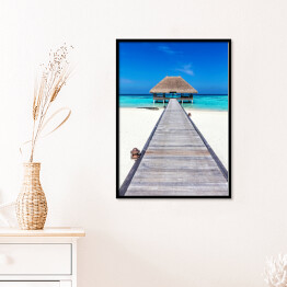 Plakat w ramie Drewniany domek na tropikalnej plaży w słoneczny dzień