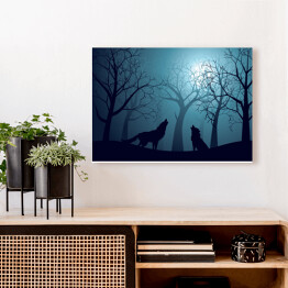 Obraz na płótnie Wilki wyjące w lesie nocą