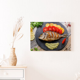 Obraz na płótnie Ryba z ziemniakami i pomidorami