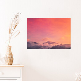 Plakat samoprzylepny Śnieżna góra skąpana w pastelowym świetle podczas zachodu słońca