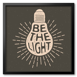 "Bądź światłem" - motywacyjne hasło z żarówką