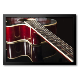 Obraz w ramie Gitara akustyczna na czarnym tle