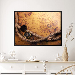 Obraz w ramie Kompas i liny na mapie starego świata