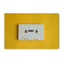 Obraz na płótnie Stara biała kaseta na żółtym tle