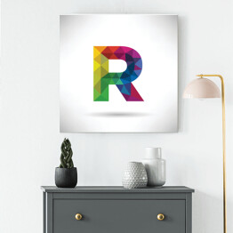 Obraz na płótnie Geometryczna kolorowa litera R unosząca się w przestrzeni