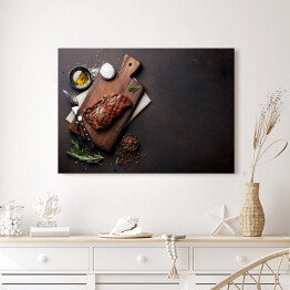 Obraz na płótnie Grillowany stek wołowy ribeye, zioła i przyprawy