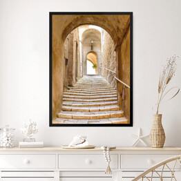 Obraz w ramie Stare kamienne schody i łuk we włoskiej wiosce