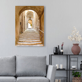 Obraz na płótnie Stare kamienne schody i łuk we włoskiej wiosce