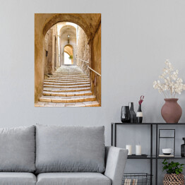 Plakat samoprzylepny Stare kamienne schody i łuk we włoskiej wiosce
