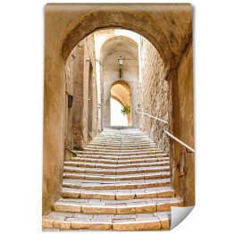 Fototapeta Stare kamienne schody i łuk we włoskiej wiosce