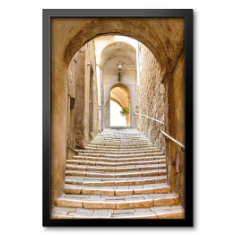 Obraz w ramie Stare kamienne schody i łuk we włoskiej wiosce