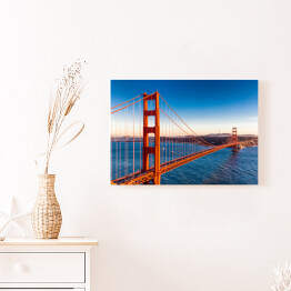 Obraz na płótnie Most Golden Gate na tle błękitu wody i nieba