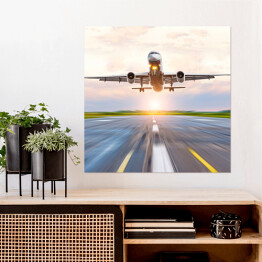Plakat samoprzylepny Samolotowa zwiększający prędkość na pasie startowym o świcie