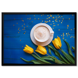 Plakat w ramie Kubek kawy z żółtymi tulipanami i notatka na błękitnym stole