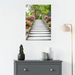 Plakat samoprzylepny Piękne kamienne schodki z kwiatami w garnkach 