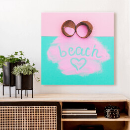 Obraz na płótnie Rozbity kokos z różową farbą i napisem "beach"