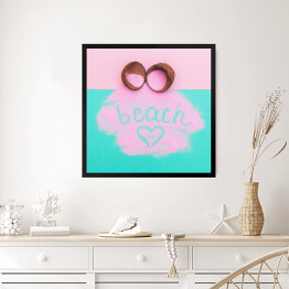 Obraz w ramie Rozbity kokos z różową farbą i napisem "beach"