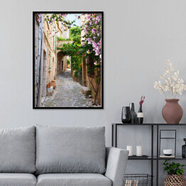Plakat w ramie Piękna stara kamienna ulica obrośnięta bluszczem we Francji