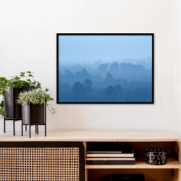 Plakat w ramie Tropikalny las deszczowy we mgle w odcieniach koloru niebieskiego