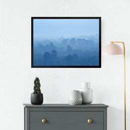 Obraz w ramie Tropikalny las deszczowy we mgle w odcieniach koloru niebieskiego