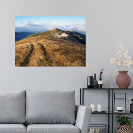 Plakat samoprzylepny Jesienny krajobraz z drogą w górach
