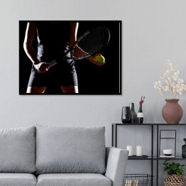 Plakat w ramie Kobieta z rakietą tenisową i piłką