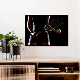 Plakat w ramie Kobieta z rakietą tenisową i piłką