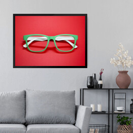 Obraz w ramie Modne okulary na czerwonym tle
