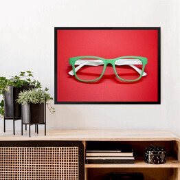 Obraz w ramie Modne okulary na czerwonym tle
