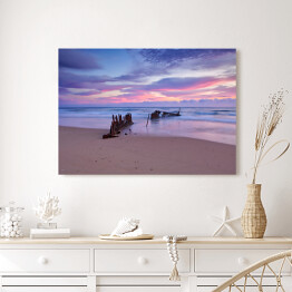 Obraz na płótnie Wschód słońca w Dicky Beach Shipwreck w Australii