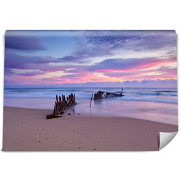Fototapeta winylowa zmywalna Wschód słońca w Dicky Beach Shipwreck w Australii