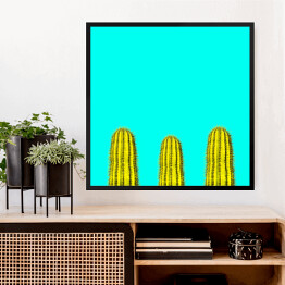 Obraz w ramie Kilka zielonych kaktusów na niebieskim tle